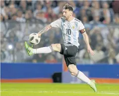 ?? AP ?? Argentina’s Lionel Messi controls the ball during the friendly game with Haiti.