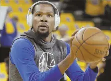  ?? AP PHOTO ?? EYE ON PRIZE: If Kevin Durant & Co. want to beat the Cavs in the NBA Finals, they’d be wise to tune out the noise and focus on the task at hand — not history.