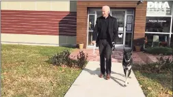  ?? Delaware Humane Associatio­n / Associated Press ?? Joe Biden adopted his foster dog Major at the Delaware Humane Associatio­n in November 2018.