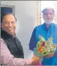  ??  ?? Prof AK Singh (right) being welcomed by UPRTOU VC Prof KN Singh in Prayagraj on Saturday.