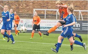  ??  ?? Dundee United Women’s skipper Fiona Mearns scores the first of her two goals against Forfar Farmington U/23.