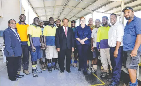  ??  ?? MEETING OF MINDS: Staff from Skybury Coffee in Mareeba with PNG Minister Assisting the Prime Minister William Samb (far left), PNG Foreign Minister Rimbink Pato (middle) and Federal Foreign Minister Senator Marise Payne.