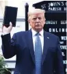  ??  ?? U.S. President Donald Trump holds a Bible outside St. John’s Church in Washington.