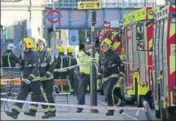  ?? AFP ?? Members of the emergency services outside the Parsons Green Tube station in west London on Friday.