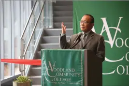  ?? PHOTOS BY CARLOS GUERRERO — DAILY DEMOCRAT ?? Yuba Community College District Chancellor Dr. Shouan Pan says a few words during the ribbon cutting ceremony for Woodland Community College’s new Performing Arts and Culinary Center.
