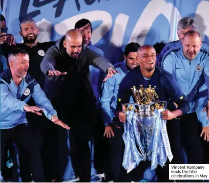  ??  ?? Vincent Kompany leads the title celebratio­ns in May