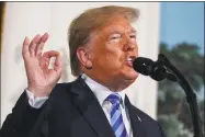  ?? Evan Vucci / Associated Press ?? President Donald Trump delivers a statement on the Iran nuclear deal from the Diplomatic Reception Room of the White House on Tuesday in Washington.