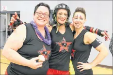  ?? CAROLE MORRIS-UNDERHILL ?? Marjie Lynn, (Tainted Shove), was all smiles after competing in the Rebel Belles’ first-ever home derby. Pictured with her are mother-daughter duo Angie Sutherland (Skinny Minny 2.Oh) and Kimberly Sutherland (Diva Slayer).