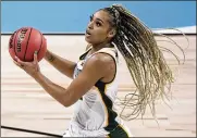  ?? MORRY GASH / AP ?? Baylor’s DiJonai Carrington scored six of her 19 points in overtime Saturday in the second-seeded Bears’ 78-75 win over Michigan.