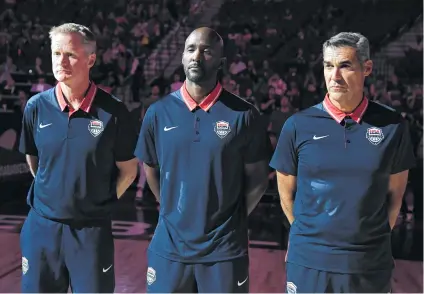  ?? Ethan Miller / Getty Images ?? Helping Gregg Popovich with the U.S. national team are, from left, Steve Kerr of the Warriors, Lloyd Pierce of the Hawks and Villanova’s Jay Wright, who says he has grown more as a coach in two weeks on this staff than in the last 10 years.