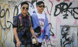  ?? ACIELLE TANBETOVA/THE NEW YORK TIMES FILE PHOTO ?? Bryan Grey Yambao, a fashion blogger known as Bryanboy, left, said the protest feels like an attack on influencer­s, who often don’t get paid to attend fashion shows.