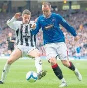  ?? ?? Lee Mair and Kris Boyd tussle in the 2010 League Cup Final