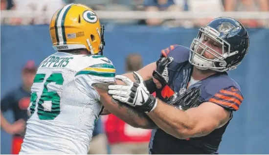  ?? | GETTY IMAGES ?? Guard Kyle Long suffered a calf injury toward the end of the Bears’ first training-camp practice Thursday. A timeline for his return might be determined by Friday.