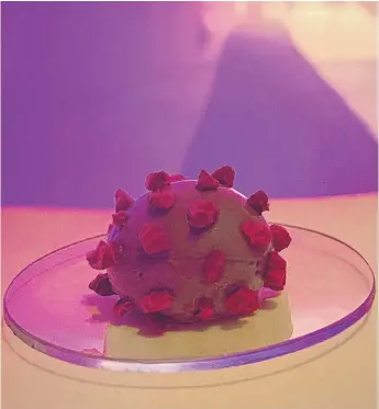  ?? PROVIDED BY ALINEA ?? The coronaviru­s-themed snack served at Alinea’s West Loop pop-up eatery caused criticism on social media from people worried that grief-stricken relatives of those killed by the virus will feel ridiculed by a pudding.