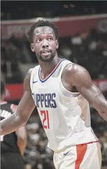  ?? Andrew D. Bernstein NBAE/Getty Images ?? NEW CLIPPERS GUARD Patrick Beverley earned first-team all-defensive honors last season with the Rockets.