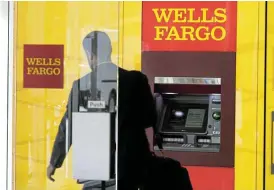  ?? /Reuters ?? Taking steps: Wells Fargo says it remains sensitive to interest rates and the health of the US economy.