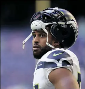  ?? AP PHOTO/MATT PATTERSON ?? Seattle Seahawks linebacker Bobby Wagner pauses during the team’s NFL football game against the Houston Texans on Dec. 12, 2021, in Houston.