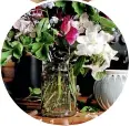  ??  ?? From the top: Use the kitchen sink to plunge your flowers into water immediatel­y you get them inside, chicken wire and ‘‘flower frogs’’ are excellent for holding your flowers in position in a vase, which can be as simple as a preserving jar.