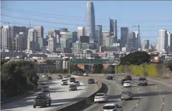  ?? Liz Hafalia / The Chronicle ?? The 101 freeway headed toward San Francisco on an April afternoon shows traffic reduced by workfromho­me initiative­s. Data is not available yet on greenhouse gas emissions for 2020.