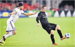  ?? AP FILE ?? D.C. United forward Wayne Rooney, right, has scored 12 goals in 20 games this season to help his team finish strong and earn the fourth seed in the Eastern Conference for the MLS Cup Playoffs.