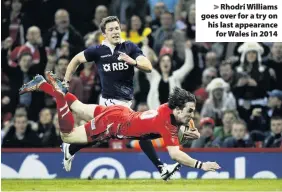  ??  ?? &gt; Rhodri Williams goes over for a try on his last appearance for Wales in 2014