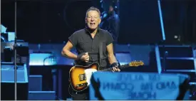  ?? ?? Bruce Springstee­n and the E Street Band perform on Feb. 1at Amalie Arena in Tampa, Fla.