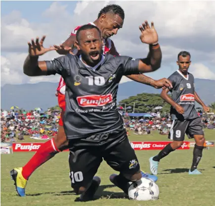 ?? Photo: Fiji FA Media. ?? Ba striker Savenaca Nakalevu is fouled by Labasa defender Taniela Waqa during their Group A clash of the Battle of the Giants tournament at Churchill Park, Lautoka on August 8, 2020.