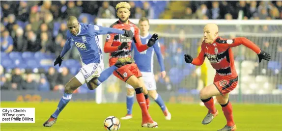  ??  ?? City’s Cheikh N’Doye goes past Philip Billing