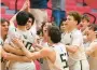  ?? AMY SHORTELL/THE MORNING CALL ?? Allentown Central Catholic players react to Lucas Mushrush’s game-winning 3-pointer in the PIAA 4A second round last year at Reading’s Geigle Complex. ACCHS beat Cardinal O’Hara 49-46.