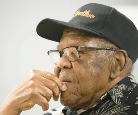  ?? KYLE TELECHAN/POST-TRIBUNE ?? Oscar Primm, 101, of Merrillvil­le, takes a moment to recall his time serving in World War II, Korea and Vietnam during an interview at AMVETS Post 6 in Gary on Monday.