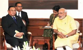  ??  ?? Minister of Foreign Affairs of Myanmar, U Wunna Maung Lwin, with Prime Minister Narendra Modi
in New Delhi on July 15, 2015