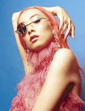  ??  ?? Rina’s new single Cherry is a catchy bubblegum jam that sounds like a throwback from the summer of ’99. “I want to write a poppy song about all these complicate­d emotions that people, especially bi-people, feel.”