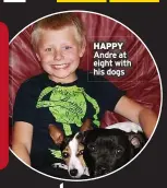  ?? ?? HAPPY
Andre at eight with his dogs