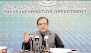  ??  ?? ISLAMABAD
Senator Shibli Faraz, Federal Minister for Informatio­n and Broadcasti­ng addressing a press conference.
-APP