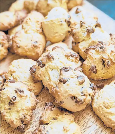  ?? GRETCHEN MCKAY/PITTSBURGH POST-GAZETTE PHOTOS ?? These cakey chocolate chip cookies from Lidia Bastianich have a secret ingredient: ricotta cheese.