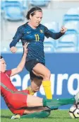  ??  ?? Matildas star Lisa De Vanna is tackled in the Portugal clash