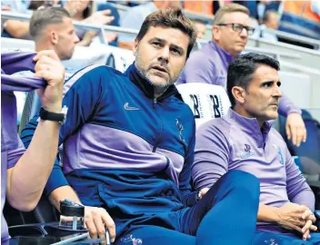  ??  ?? Downward curve: Mauricio Pochettino’s cycle of excellence at Spurs (above) is under scrutiny; Ben Stokes (below, right) and Jack Leach celebrate Ashes victory