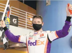  ?? CHRIS GRAYTHEN/GETTY IMAGES/TNS FILE ?? Denny Hamlin, pictured after winning the Dixie Vodka 400 last year, has won the past two Daytona 500s.