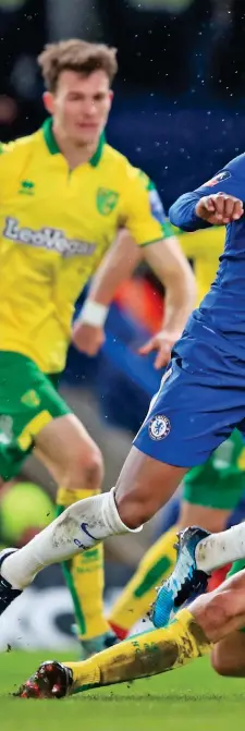  ??  ?? The crime: Chelsea forward Willian tumbles to the turf and is then is accused of diving after this crunching challenge by Norwich centre back Timm Klose