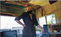  ?? RAY CHAVEZ — STAFF PHOTOGRAPH­ER ?? Isaia diGennaro pauses inside an RV he’s renting in West Oakland on April 9. “I’ve been housing insecure and homeless for a while, and this is the most permanent place I’ve been living at in the past year,” diGennaro said.