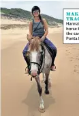  ??  ?? MAKING TRACKS
Hannah rides horse Blazy on the sands of Ponta Mamoli