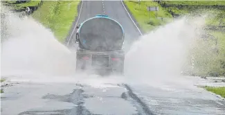  ?? Picture: Kevin Farmer ?? BIG DAMAGE: Roads across the Toowoomba region wrecked by the February weather events could take up to two years to repair.