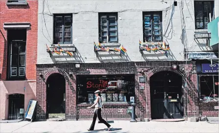  ?? NEW YORK TIMES FILE PHOTO ?? The Stonewall Inn in Manhattan is where a 1969 police raid helped spark the modern gay-rights movement. Faced with the possibilit­y of being the only Major League Baseball team not to have held a pride night at a game, the New York Yankees are developing a series of events next season tied to the celebratio­ns of the 50th anniversar­y of the Stonewall riots.