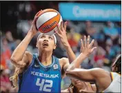  ?? DANIEL PASSAPERA/SPECIAL TO THE DAY ?? Connecticu­t Sun forward Brionna Jones drives the ball in the paint during a WNBA game against the Indiana Fever on June 8 at Mohegan Sun Arena.