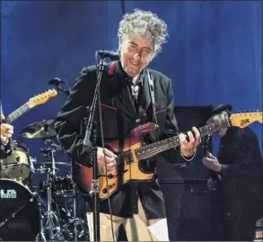  ?? The New York Times ?? Bob Dylan performs at the Capitol Theater in Port Chester in 2012. Rock’s Nobel Prize winner was scheduled to play SPAC this week before the pandemic derailed live shows.