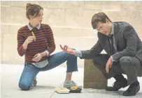  ?? K.C. BAILEY/NETFLIX ?? Zoey Deutch and Glen Powell star in the new Netflix rom-com Set It Up, about assistants who decide to set up their miserable and difficult bosses.