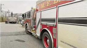  ?? Meriden Fire Local 1148/Facebook ?? Firefighte­rs at a three-alarm blaze at North Broad Street home in Meriden in January. Caustic fumes from synthetic materials used in modern buildings have been linked to several forms of cancer, prompting firefighte­rs to push for a “rebuttable presumptio­n” that a cancer diagnosis is related to their job, for the purposes of workers compensati­on claims.