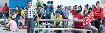  ?? PHA LINA ?? Garment workers protest at Long Victory Internatio­nal in Russey Keo district’s Tuol Sangke commune in the capital.