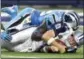  ?? MICHAEL AINSWORTH — AP ?? In this file photo, Dallas Cowboys quarterbac­k Tony Romo (9) is sacked by Carolina Panthers outside linebacker Thomas Davis (58) during a game in 2015. Romo was injured on the play. The Cowboys will release Romo when the NFL year opens on Thursday.