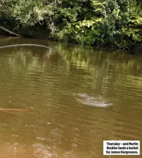  ??  ?? Thursday – and Martin Buckler lands a barbel for James Hargreaves.